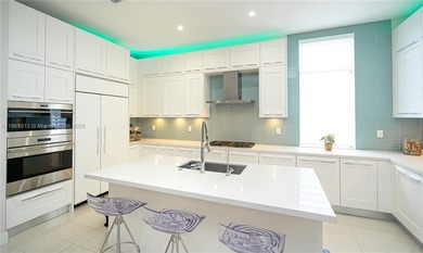 Discover LUXURY living in the heart of DOWNTOWN DORAL w/this