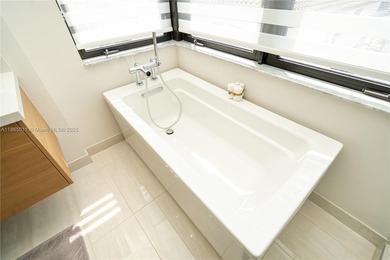 Discover LUXURY living in the heart of DOWNTOWN DORAL w/this