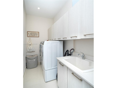 Discover LUXURY living in the heart of DOWNTOWN DORAL w/this