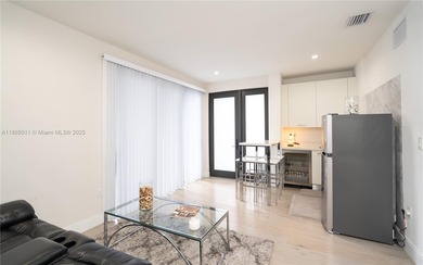 Discover LUXURY living in the heart of DOWNTOWN DORAL w/this