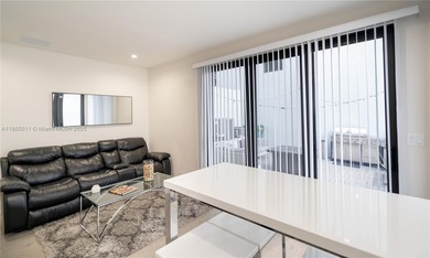 Discover LUXURY living in the heart of DOWNTOWN DORAL w/this