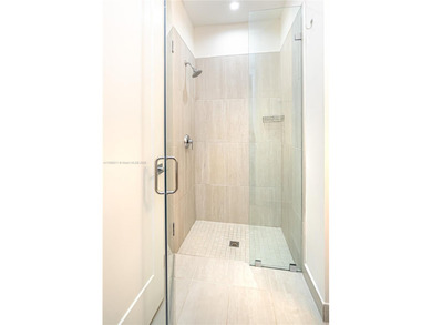 Discover LUXURY living in the heart of DOWNTOWN DORAL w/this