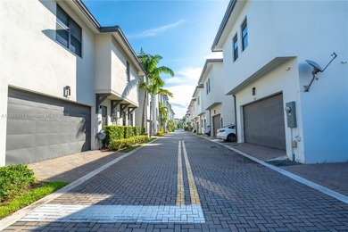 Discover LUXURY living in the heart of DOWNTOWN DORAL w/this