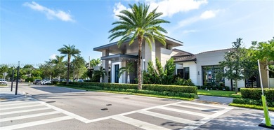 Discover LUXURY living in the heart of DOWNTOWN DORAL w/this