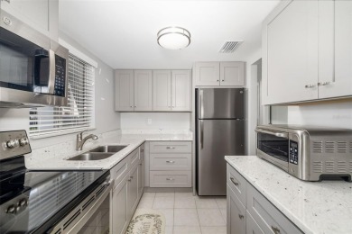 Discover effortless Florida living in this fully remodeled