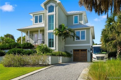 EXTREMELY RARE chance to own a stunning home RIGHT on King's Bay