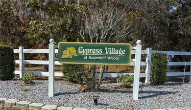 Welcome to this remarkable home in Cypress Village of Sugarmill