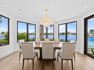 Live the true *South Florida Lifestyle* on this island's gated