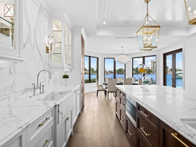 Live the true *South Florida Lifestyle* on this island's gated