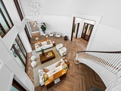 Live the true *South Florida Lifestyle* on this island's gated