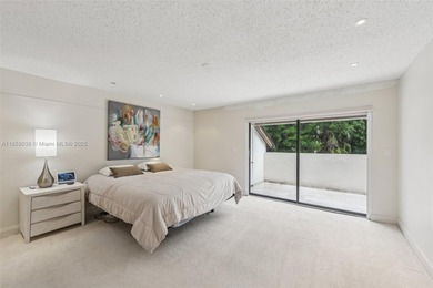 Welcome to this beautifully maintained two-story condo in