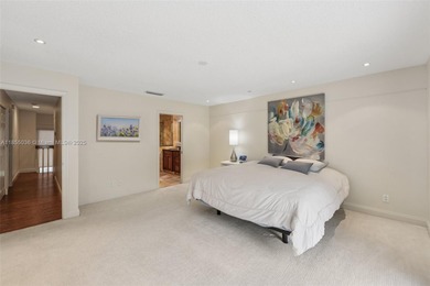 Welcome to this beautifully maintained two-story condo in