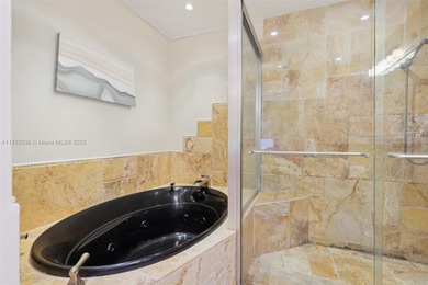 Welcome to this beautifully maintained two-story condo in