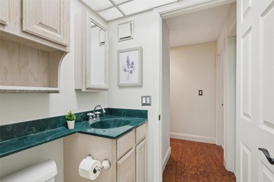 Welcome to this beautifully maintained two-story condo in