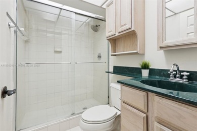 Welcome to this beautifully maintained two-story condo in