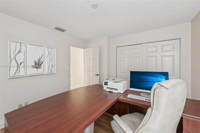 Welcome to this beautifully maintained two-story condo in