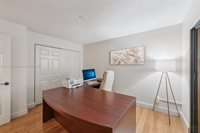 Welcome to this beautifully maintained two-story condo in