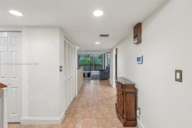 Welcome to this beautifully maintained two-story condo in
