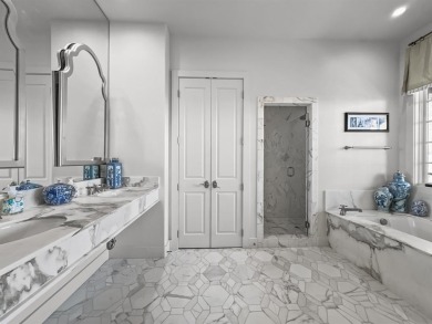 Nestled within a prestigious gated community of the Harbor, this