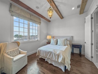 Nestled within a prestigious gated community of the Harbor, this