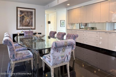 This striking three story, 7000+ square foot residence is