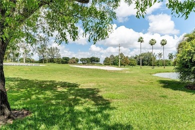 Enjoy the beautiful golf course views from this updated