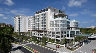 Experience Boca's Beauty from this Lanai Residence with a