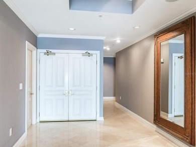 This is a magnificent condo, an entire half floor with almost 1