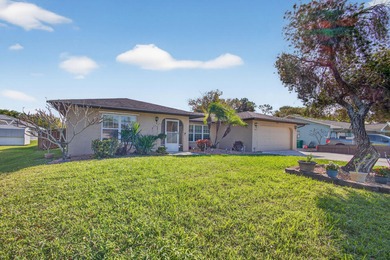 Welcome to this well-maintained 3-bedroom, 2-bath, 2-car garage