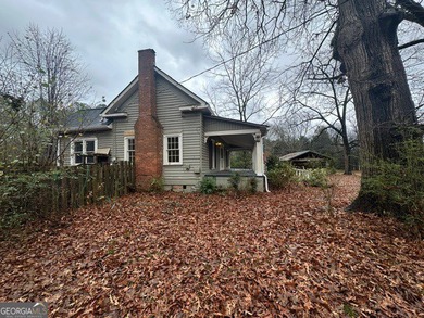 Must see this charming 1900 Farmhouse on 5.86 Acres with Vintage