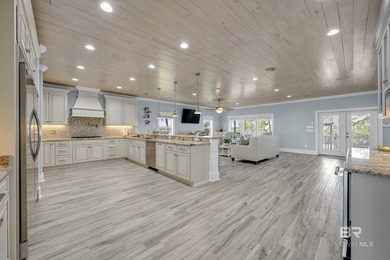 Waterfront luxury meets peace of mind just 100 yards from the