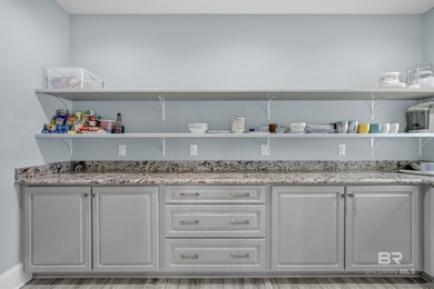 Waterfront luxury meets peace of mind just 100 yards from the