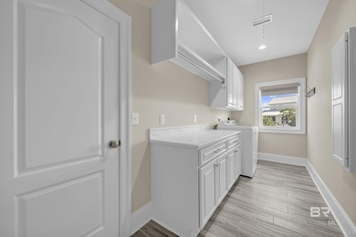 Waterfront luxury meets peace of mind just 100 yards from the