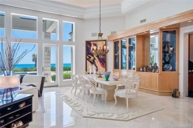 Direct oceanfront French chateau-style estate, set on one of