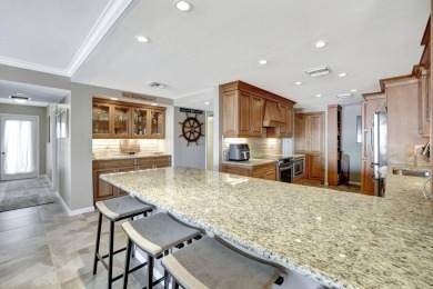 Experience the ultimate Gulf front living at this stunning