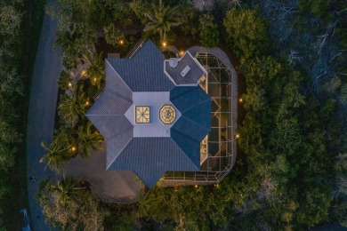 An architectural masterpiece, this Frank Lloyd Wright-inspired