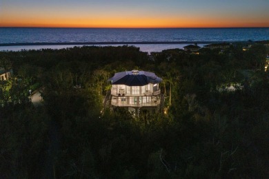 An architectural masterpiece, this Frank Lloyd Wright-inspired