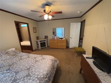 Welcome to 27 Bokchito St in Canadian! This 3-bedroom, 2 bath