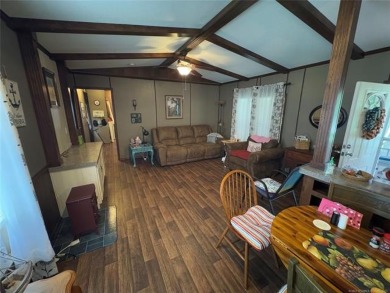 Welcome to 27 Bokchito St in Canadian! This 3-bedroom, 2 bath