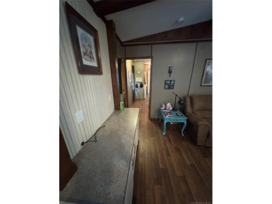 Welcome to 27 Bokchito St in Canadian! This 3-bedroom, 2 bath