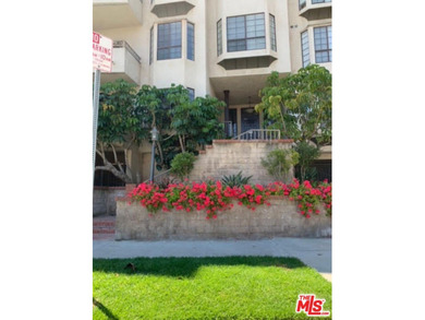 Beautiful, bright, remodeled one-bedroom, two-bath condo