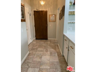 Beautiful, bright, remodeled one-bedroom, two-bath condo