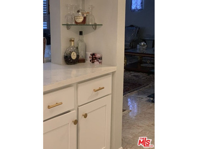 Beautiful, bright, remodeled one-bedroom, two-bath condo