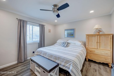 Experience coastal living at its finest in this beautifully