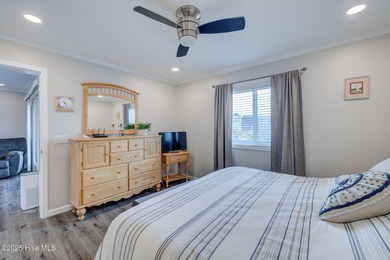 Experience coastal living at its finest in this beautifully