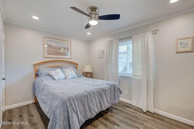 Experience coastal living at its finest in this beautifully