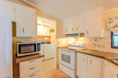 Welcome to Oceanside Landing, a highly sought-after 55+