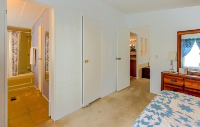 Welcome to Oceanside Landing, a highly sought-after 55+