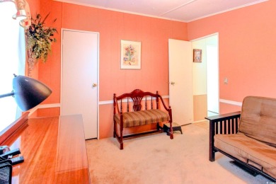 Welcome to Oceanside Landing, a highly sought-after 55+