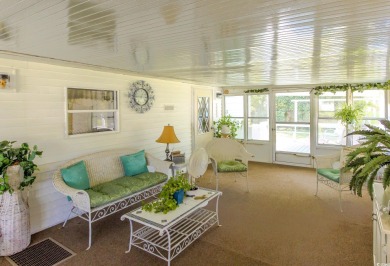 Welcome to Oceanside Landing, a highly sought-after 55+